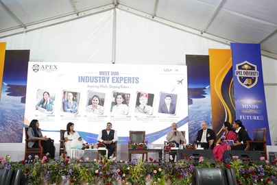 A panel discussion on stage at the Apex University industry experts event